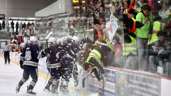 Glass boards shatters during a high school hockey game in Rochester