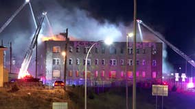 Minneapolis crews battle fire at vacant apartment building