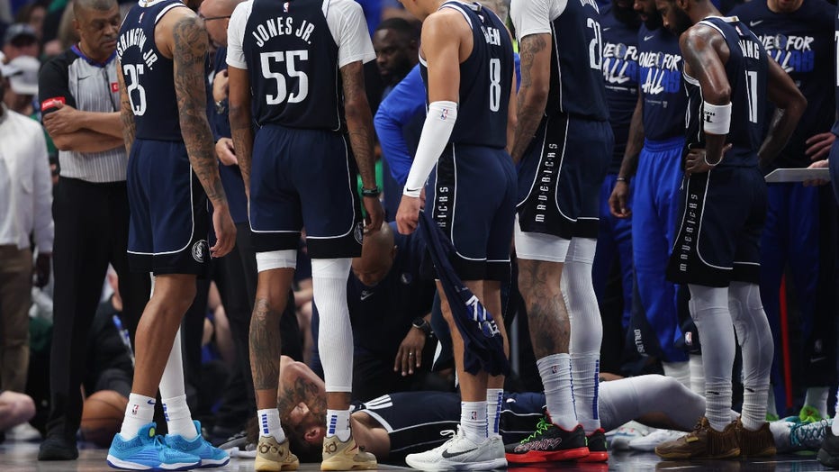 9175578b-wolves-mavericks-game-3.jpg