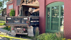 Xcel Energy driver crashes truck into building along Hennepin Avenue