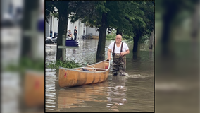 Waterville dentist uses canoe to keep his practice afloat during flood