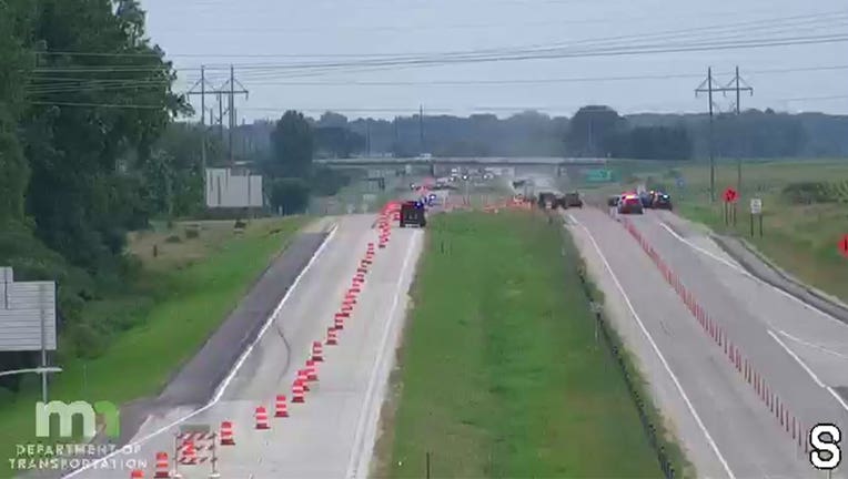 Aside from police officers, I-35 is empty as they respond to an emergency along the highway on the south side of Faribault.