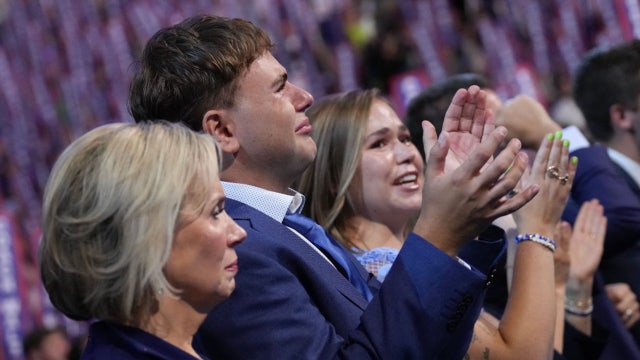 Gus Walz shouts 'That's my dad!' through tears at DNC
