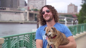 St. Paul man on a mission to walk blind, deaf dog on every bridge in Twin Cities