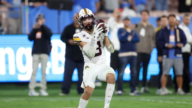 Koi Perich sports dual jersey at Gophers spring football practice