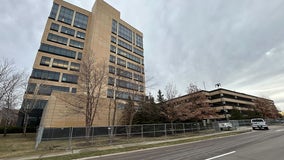 UnitedHealthcare headquarters partially surrounded by fencing as hunt for CEO killer continues