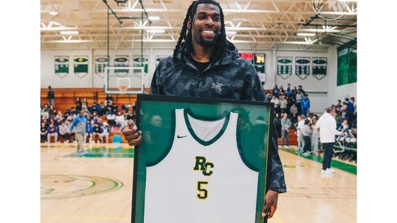 Naz Reid has high school jersey retired in front of Timberwolves teammates