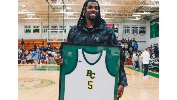 Naz Reid has high school jersey retired in front of Timberwolves teammates