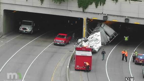 Semi carrying ammunition strikes wall in Lowry Hill Tunnel
