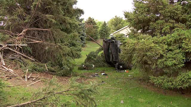 Car goes off highway, through fence and strikes tree in Brooklyn Center crash