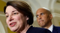 Sen. Booker: Democrats ‘complicit’ in Trump agenda, Klobuchar fires back