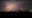 Anoka sky lit up simultaneously by fireworks, lightning