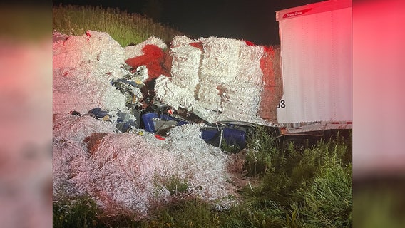 Wisconsin driver rescued after being buried by paper bales in semi crash