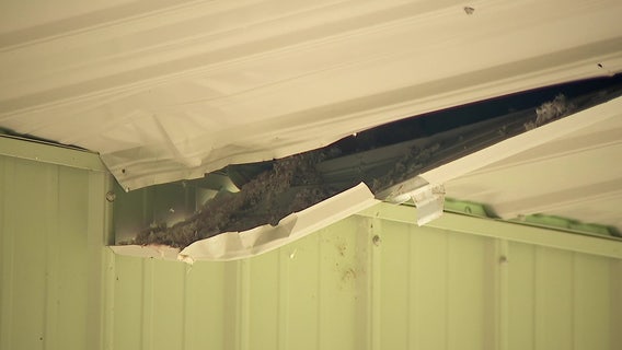 Homeowner left with questions after ice chunk falls on pole barn