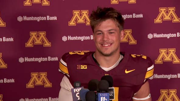 Gophers' star Koi Perich wears WWE-style championship belt at media day