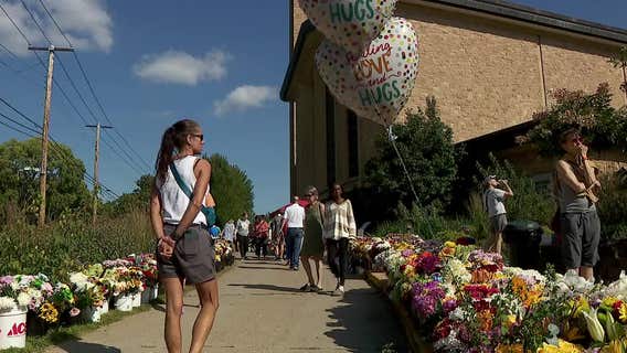 Annunciation Church memorial wraps around building as community grieves, holds mass