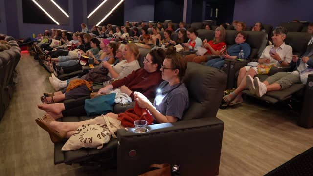 Crafting at the movies crowd forms a tight-knit community