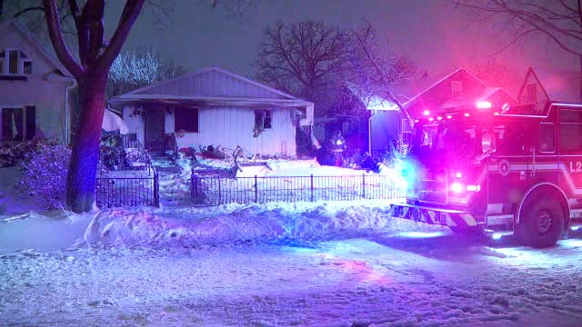 2 hurt after fire burns through 'over packed' Minneapolis home