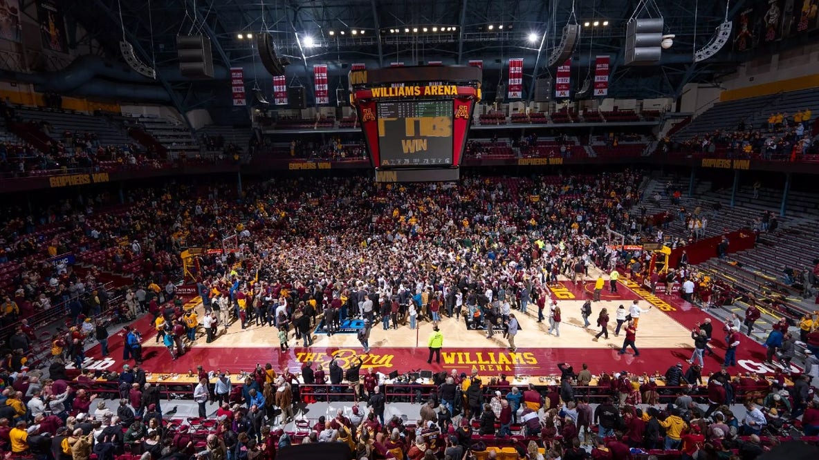 Gophers fans storm Williams Arena floor after beating No. 10 Michigan State, 76-73