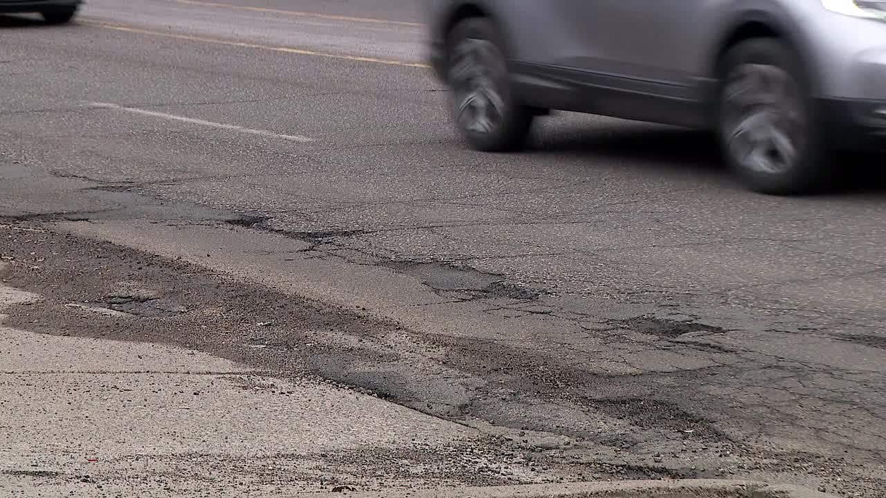St. Paul drivers battle potholes as repair shops stay busy