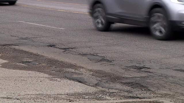 St. Paul drivers battle potholes as repair shops stay busy