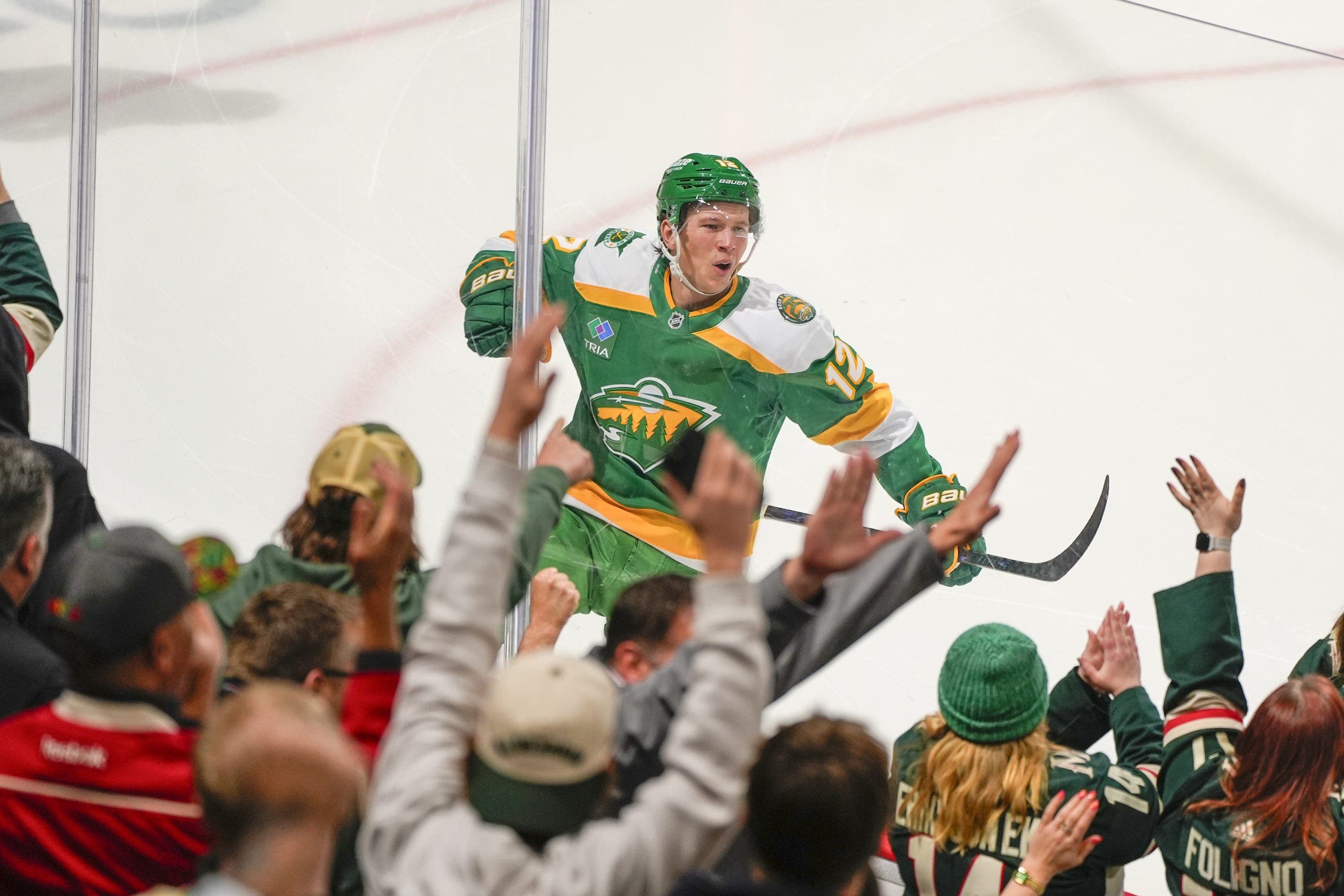 Wild beats Vancouver to clinch playoff spot for 5th time in 6 seasons