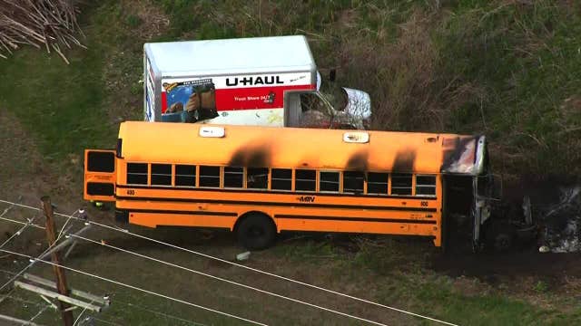 School bus catches fire after crashing into U-Haul in Minneapolis