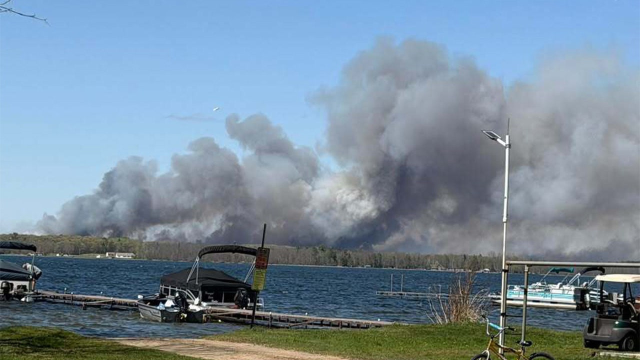 Flanders wildfire: Crews continue battling hot spots as County Road 11 remains closed