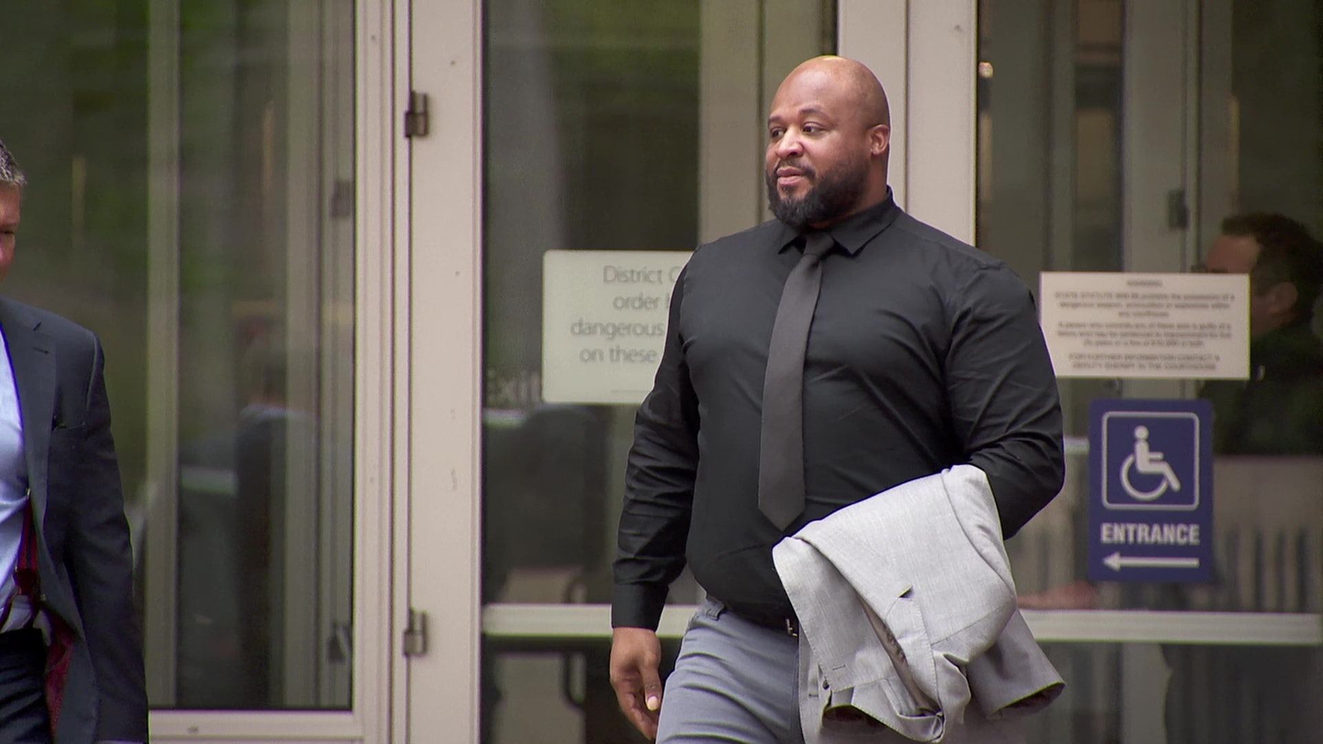 ICE agent appears in court on assault charges from highway gun-pointing incident