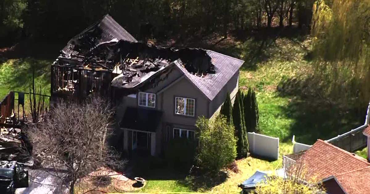 Ramsey home seriously damaged, swampy area burned in fire