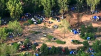 St. Paul homeless encampment by apartment grows after Pig’s Eye closure