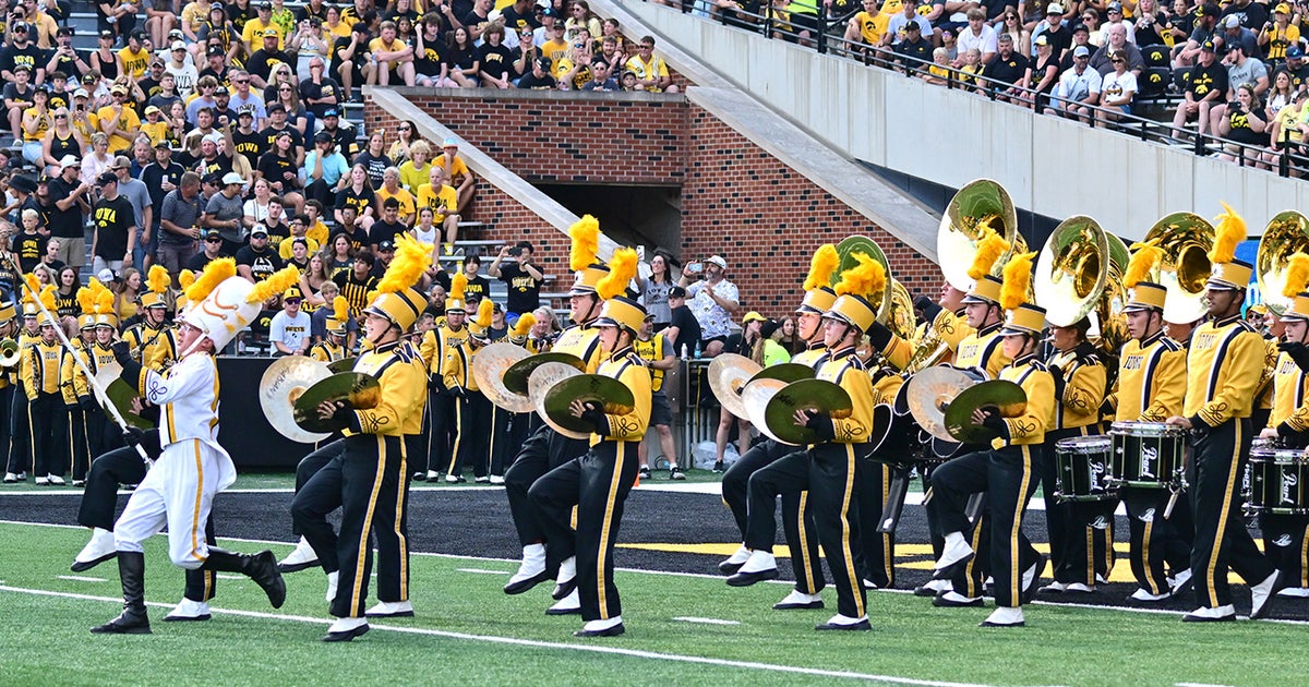 Marching band community mourns loss of Iowa student who collapsed at Hawkeye game