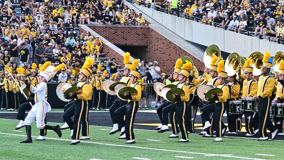 Marching band community mourns loss of Iowa student who collapsed at Hawkeye game