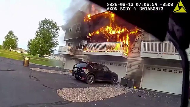 Eau Claire police officer evacuates town house during fire: Video