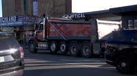 St. Paul crash: Woman killed by dump truck while crossing street in Highland Park