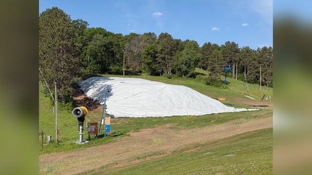 Wisconsin's Trollhaugen opens ski season early with saved snow