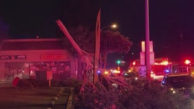 2 seriously injured after car plows into business in Downey strip mall