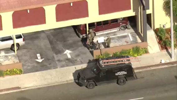 Suspect in custody after being barricaded inside Long Beach building