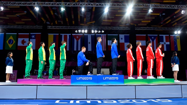 American gold medalist kneels during national anthem at Pan Am Games
