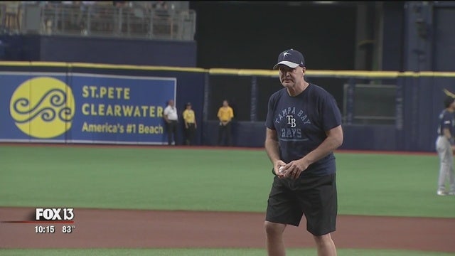 Doctors gave him 3 months to live; 8 months later, he throws first pitch at Rays game