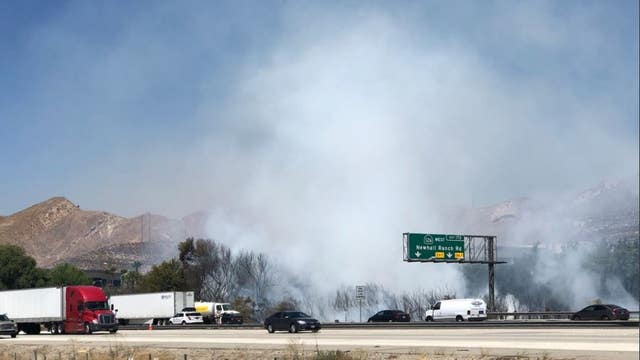 Brush fire in Valencia causes three lanes to be closed on NB 5 Freeway