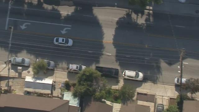 Police pursue white sedan from Azusa to West Covina