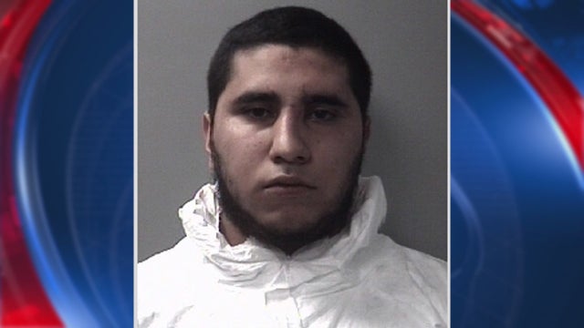 While free on bond, man charged with killing pregnant wife