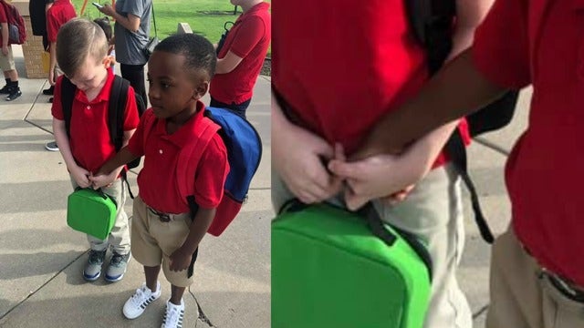 Boy, 8, holds hand of crying classmate with autism: 'He’s a kid with a big heart'