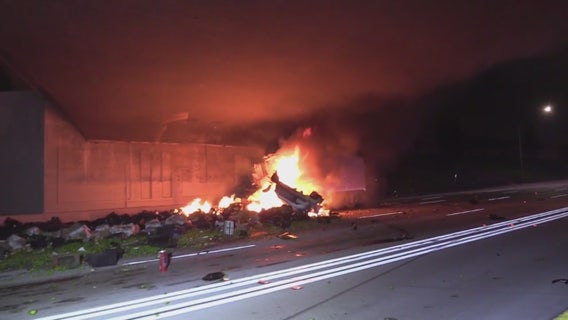 Big rig crashes in Anaheim, catches fire, driver hospitalized