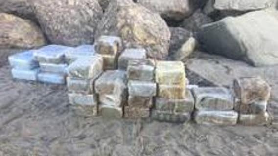 Beached panga carrying dozens of bales of marijuana located in Malibu