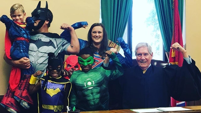 Family wears superhero costumes to ‘fearless and brave’ 4-year-old’s adoption