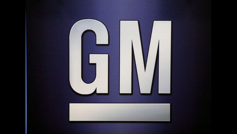 DETROIT, MI-JUNE 6: The General Motors logo is shown on the podium at the company's annual meeting of shareholders June 6, 2017 in Detroit, Michigan. The results of a fight between the company and hedge fund Greenlight Capital, which has proposed to split the automaker's stock and change its board of directors, was to be announced. (Photo by Bill Pugliano/Getty Images)