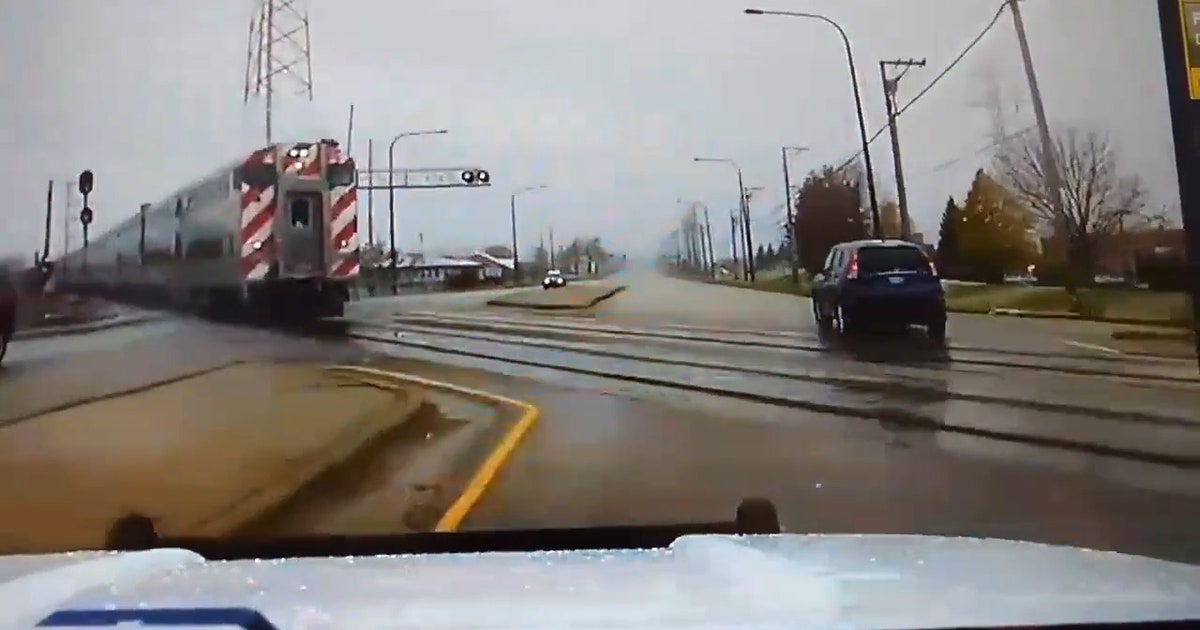 Watch: Officer narrowly misses being hit by train | FOX 11 Los Angeles