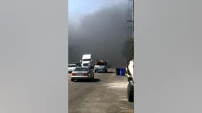 House fire in Fontana sparks blaze in nearby vegetation area